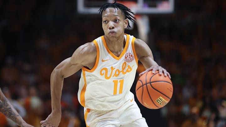 Mar 1, 2025; Knoxville, Tennessee, USA; Tennessee Volunteers guard Jordan Gainey (11) moves the ball against the Alabama Crimson Tide during the first half at Thompson-Boling Arena at Food City Center. Mandatory Credit: Randy Sartin-Imagn Images