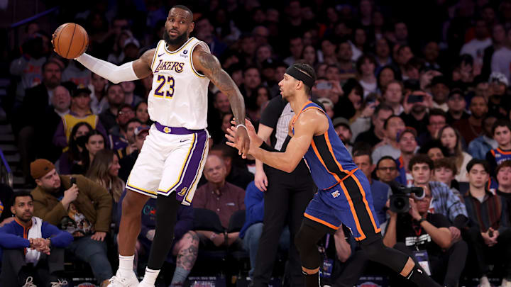 Feb 3, 2024; New York, New York, USA; Los Angeles Lakers forward LeBron James (23) controls the ball against New York Knicks guard Josh Hart (3) during the fourth quarter at Madison Square Garden. Mandatory Credit: Brad Penner-Imagn Images Feb 3, 2024; New York, New York, USA; Los Angeles Lakers forward LeBron James (23) controls the ball against New York Knicks guard Josh Hart (3) during the fourth quarter at Madison Square Garden. Mandatory Credit: Brad Penner-Imagn Images