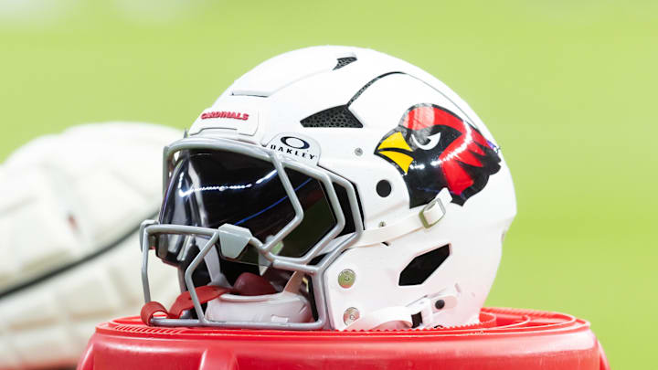 Aug 2, 2025; Glendale, AZ, USA; Detailed view of an Arizona Cardinals helmet during the Red and White practice in training camp at State Farm Stadium. Mandatory Credit: Mark J. Rebilas-Imagn Images Aug 2, 2025; Glendale, AZ, USA; Detailed view of an Arizona Cardinals helmet during the Red and White practice in training camp at State Farm Stadium. Mandatory Credit: Mark J. Rebilas-Imagn Images