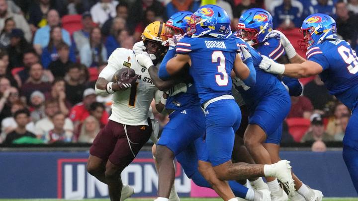 Sep 19, 2026; London, ENG; Arizona State Sun Devils running back Kyson Brown (1) runs with the ball against the Kansas Jayhawks during the first quarter at Wembley Stadium. Mandatory Credit: Peter van den Berg-Imagn Images Sep 19, 2026; London, ENG; Arizona State Sun Devils running back Kyson Brown (1) runs with the ball against the Kansas Jayhawks during the first quarter at Wembley Stadium. Mandatory Credit: Peter van den Berg-Imagn Images