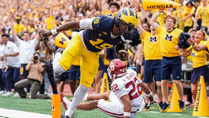 Michigan quarterback Bryce Underwood (19) runs into the end zone for a touchdown against Oklahoma during the first half at Michigan Stadium in Ann Arbor on Saturday, Sept. 12, 2026. Michigan quarterback Bryce Underwood (19) runs into the end zone for a touchdown against Oklahoma during the first half at Michigan Stadium in Ann Arbor on Saturday, Sept. 12, 2026.