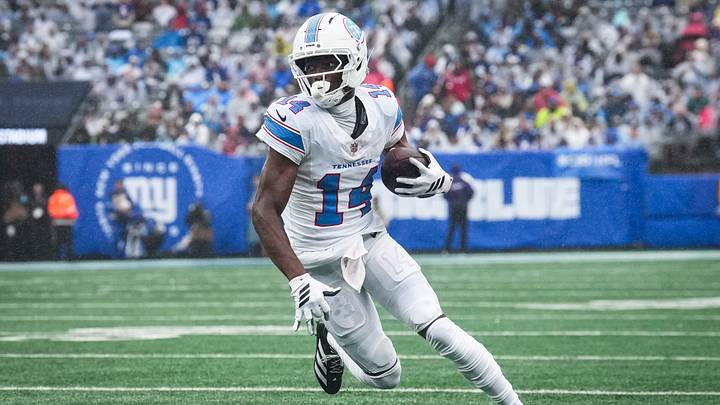 Tennessee Titans wide receiver Carnell Tate (14) runs with the ball during a game against the New York Giants at MetLife Stadium, Sep 27, 2026, East Rutherford, NJ, USA.