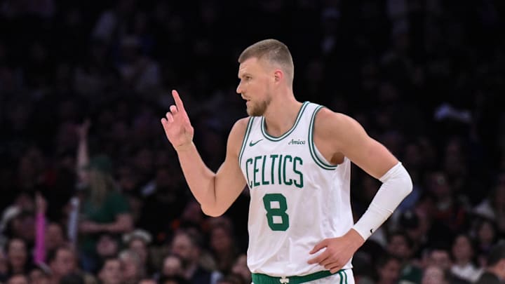 Apr 8, 2025; New York, New York, USA; Boston Celtics center Kristaps Porzingis (8) reacts during the first half against the New York Knicks at Madison Square Garden. Mandatory Credit: John Jones-Imagn Images