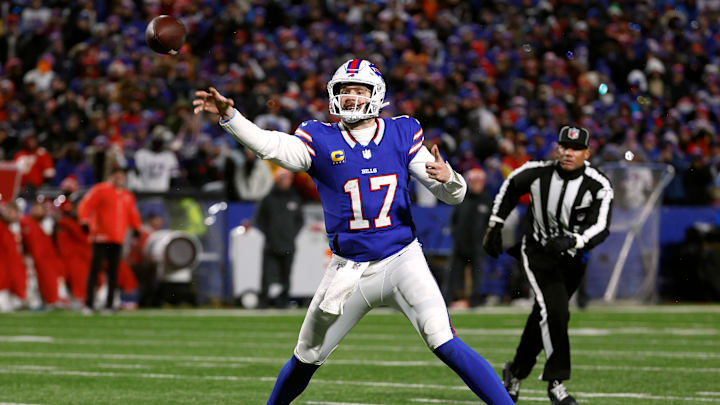 Buffalo Bills quarterback Josh Allen (17) makes an off balance for a 13-yard touchdown in the AFC Divisional Playoffs against the Kansas City Chiefs. 