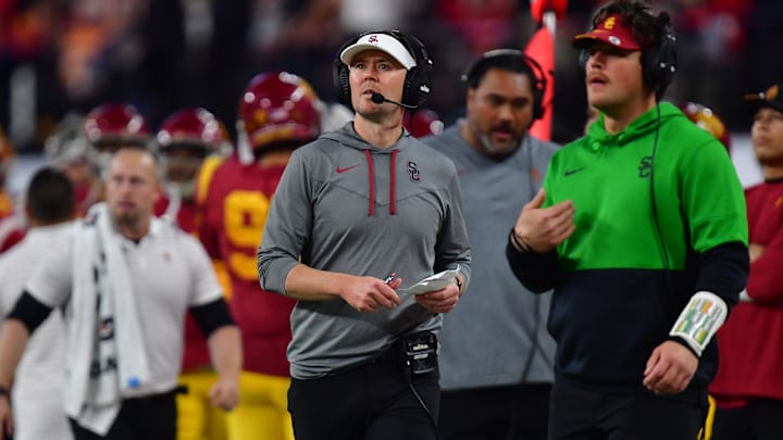 Dec 2, 2022; Las Vegas, NV, USA; Southern California Trojans head coach Lincoln Riley watches game action against the Utah Utes during the second half in the PAC-12 Football Championship at Allegiant Stadium. Mandatory Credit: Gary A. Vasquez-Imagn Images