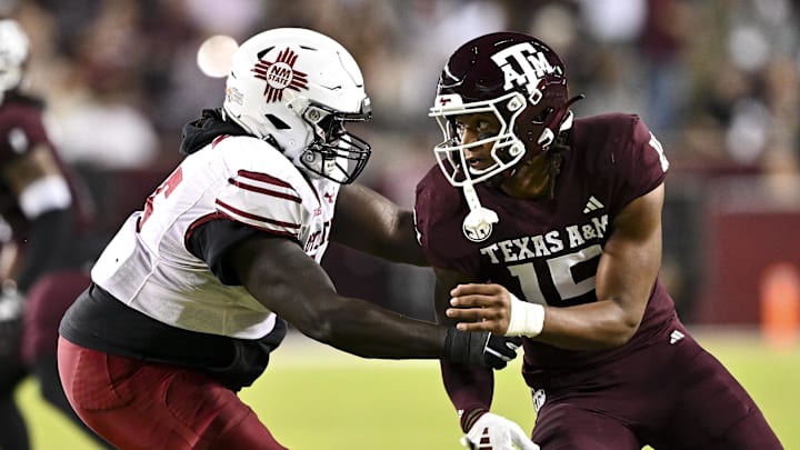 Texas A&M Aggies defensive lineman Rylan Kennedy runs around the edge against the New Mexico State Aggies during the first half at Kyle Field.  