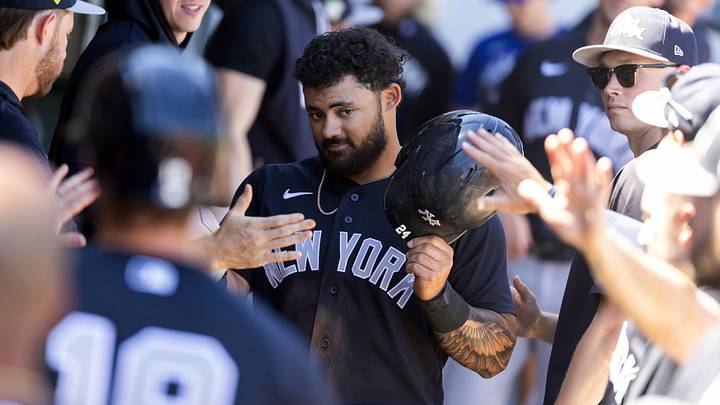 Mar 24, 2026; Mesa, Arizona, USA; New York Yankees outfielder Jasson Dominguez celebrates with teammates in the dugout after scoring against the Chicago Cubs during spring training at Sloan Park. Mandatory Credit: Mark J. Rebilas-Imagn Images Mar 24, 2026; Mesa, Arizona, USA; New York Yankees outfielder Jasson Dominguez celebrates with teammates in the dugout after scoring against the Chicago Cubs during spring training at Sloan Park. Mandatory Credit: Mark J. Rebilas-Imagn Images