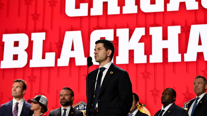 Jun 28, 2023; Nashville, Tennessee, USA; Chicago Blackhawks general manager Kyle Davidson makes the nineteenth pick in round one of the 2023 NHL Draft at Bridgestone Arena. Mandatory Credit: Christopher Hanewinckel-Imagn Images