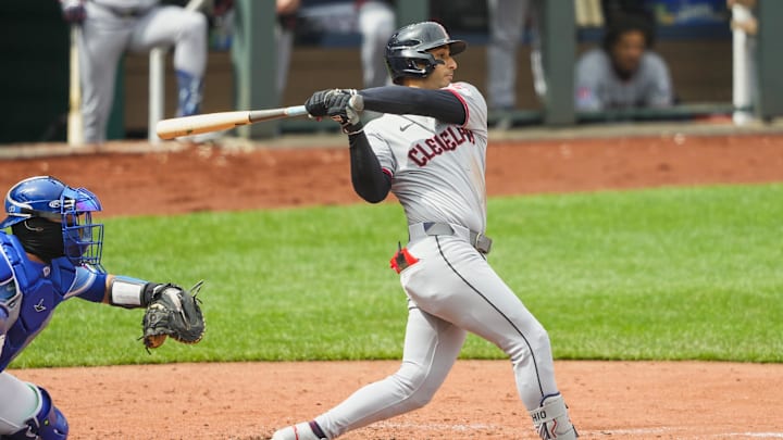 Mar 30, 2025; Kansas City, Missouri, USA; Cleveland Guardians shortstop Brayan Rocchio (4) bats during the fourth inning against the Kansas City Royals at Kauffman Stadium. Mandatory Credit: Jay Biggerstaff-Imagn Images