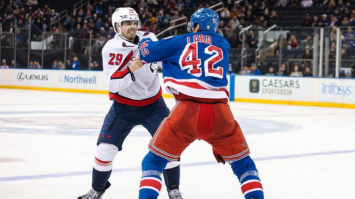 Apr 5, 2026; New York, New York, USA; New York Rangers center Noah Laba (42) fights with Washington Capitals center Hendrix Lapierre (29) during the third period at Madison Square Garden. Mandatory Credit: Danny Wild-Imagn Images