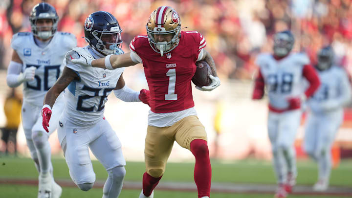 Dec 14, 2025; Santa Clara, California, USA; San Francisco 49ers wide receiver Ricky Pearsall (1) stiff arms Tennessee Titans cornerback Marcus Harris (26) during the third quarter at Levi's Stadium. Mandatory Credit: Cary Edmondson-Imagn Images Dec 14, 2025; Santa Clara, California, USA; San Francisco 49ers wide receiver Ricky Pearsall (1) stiff arms Tennessee Titans cornerback Marcus Harris (26) during the third quarter at Levi's Stadium. Mandatory Credit: Cary Edmondson-Imagn Images