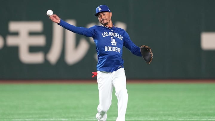Los Angeles Dodgers shortstop Betts warms up before the game against the Yomiuri Giants at Tokyo Dome.