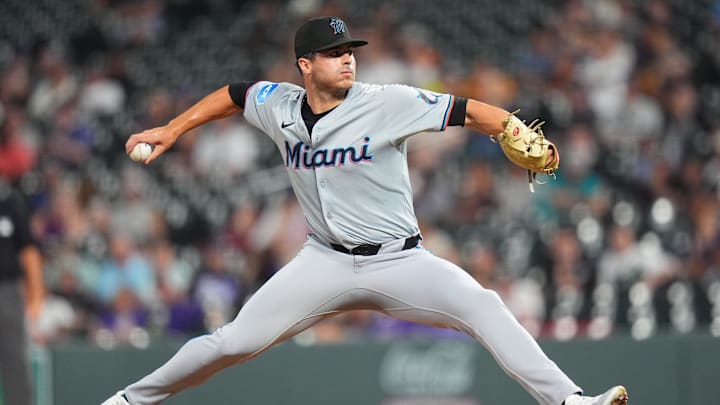 Aug 26, 2024; Denver, Colorado, USA; Miami Marlins relief pitcher John McMillon (66) delivers a pitch in the ninth inning against the Colorado Rockies at Coors Field. 