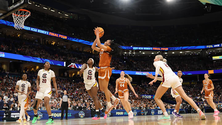 Texas Longhorns guard Jordan Lee (7) shoots against South Carolina Gamecocks guard Raven Johnson (25) during 2025 NCAA tournament, April 4, 2025 at Amalie Arena in Tampa, Florida. Texas Longhorns guard Jordan Lee (7) shoots against South Carolina Gamecocks guard Raven Johnson (25) during 2025 NCAA tournament, April 4, 2025 at Amalie Arena in Tampa, Florida.