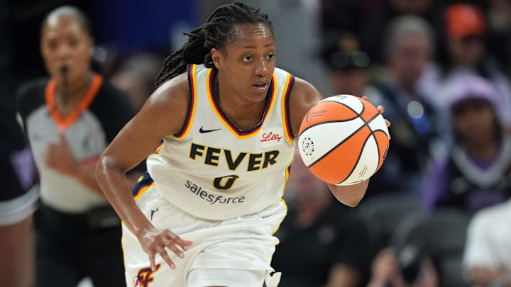 Aug 31, 2025; San Francisco, California, USA; Indiana Fever guard Kelsey Mitchell (0) dribbles against the Golden State Valkyries during the third quarter at Chase Center. Mandatory Credit: Darren Yamashita-Imagn Images
