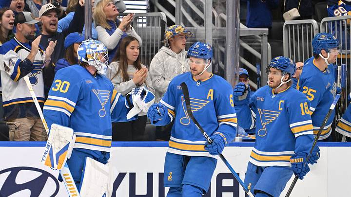 Oct 20, 2026; St. Louis, Missouri, USA;  St. Louis Blues defenseman Philip Broberg (6) is congratulated by goaltender Joel Hofer (30) and center Robert Thomas (18) after scoring against the Winnipeg Jets during the third period at Enterprise Center.  Mandatory Credit: Jeff Le-Imagn Images
