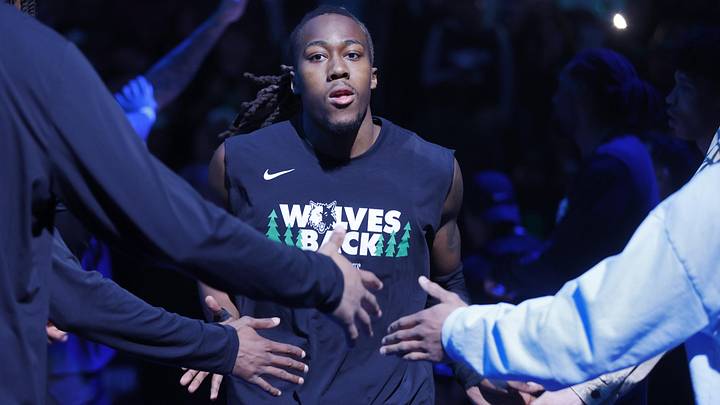 May 10, 2026; Minneapolis, Minnesota, USA; Minnesota Timberwolves guard Ayo Dosunmu (13) walks out during introductions before game four of the second round of the 2026 NBA Playoffs with the San Antonio Spurs at Target Center. Mandatory Credit: Bruce Kluckhohn-Imagn Images