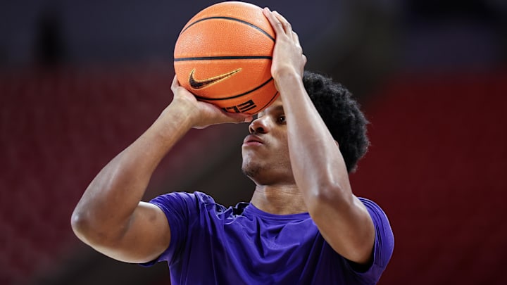 Feb 14, 2026; Houston, Texas, USA;  Kansas State Wildcats forward Taj Manning (15) warms up before playing against the Houston Cougars at Fertitta Center.