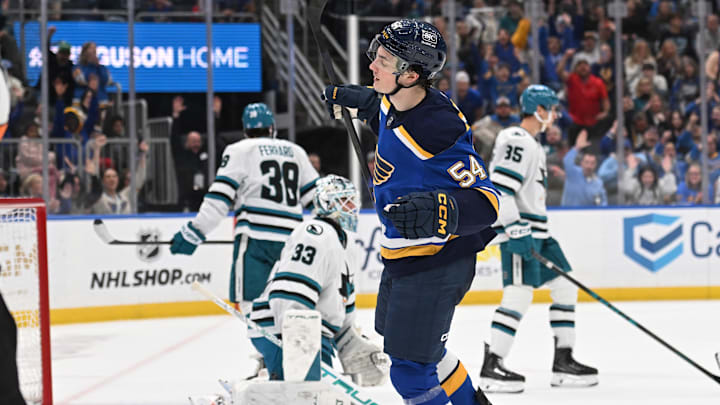 Mar 26, 2026; St. Louis, Missouri, USA; St. Louis Blues right wing Dalibor Dvorsky (54) celebrates after scoring a goal past San Jose Sharks goaltender Alex Nedeljkovic (33) in the second period at Enterprise Center. Mandatory Credit: Joe Puetz-Imagn Images