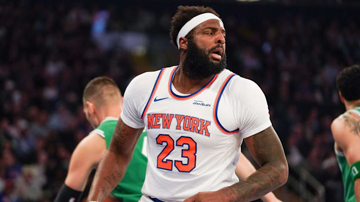 New York Knicks center Mitchell Robinson (23) reacts after scoring during the first half against the Boston Celtics at Madison Square Garden. New York Knicks center Mitchell Robinson (23) reacts after scoring during the first half against the Boston Celtics at Madison Square Garden.