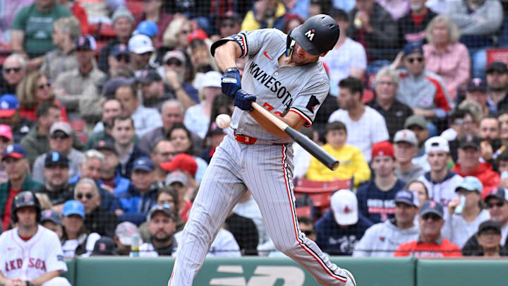 Minnesota Twins right fielder Matt Wallner (38) hits a single against the Boston Red Sox during the fifth inning at Fenway Park in Boston on Sept. 22, 2024. Minnesota Twins right fielder Matt Wallner (38) hits a single against the Boston Red Sox during the fifth inning at Fenway Park in Boston on Sept. 22, 2024.