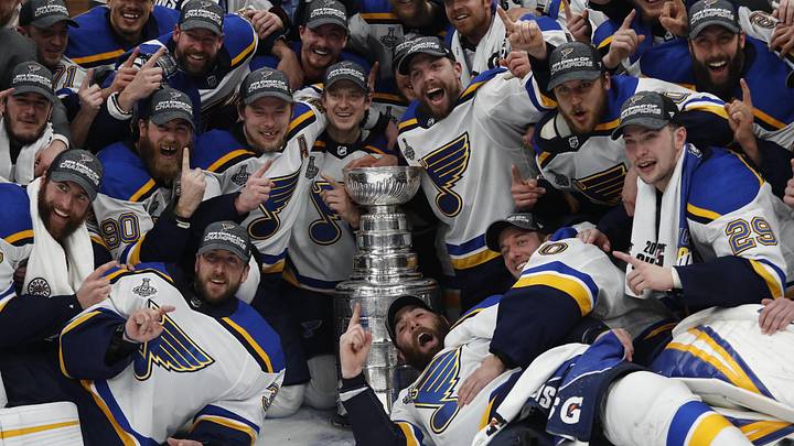 Jun 12, 2019; Boston, MA, USA; St. Louis Blues players pose for a team photo with the Stanley Cup after defeating the Boston Bruins in game seven of the 2019 Stanley Cup Final at TD Garden. Mandatory Credit: Winslow Townson-Imagn Images Jun 12, 2019; Boston, MA, USA; St. Louis Blues players pose for a team photo with the Stanley Cup after defeating the Boston Bruins in game seven of the 2019 Stanley Cup Final at TD Garden. Mandatory Credit: Winslow Townson-Imagn Images