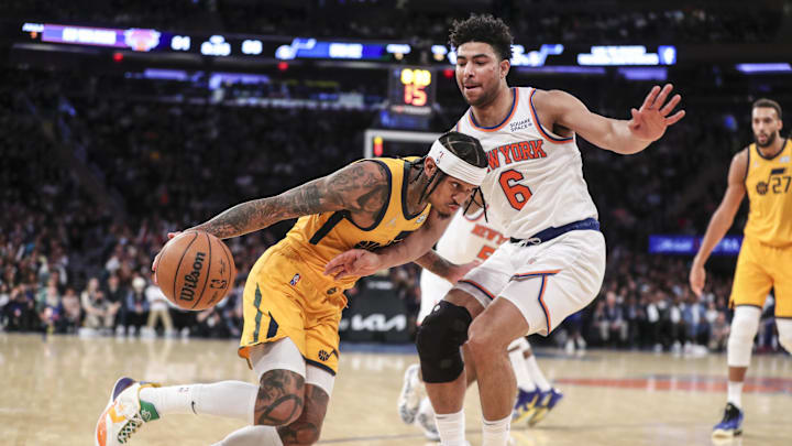 Mar 20, 2022; New York, New York, USA;  Utah Jazz guard Jordan Clarkson (00) looks to drive past New