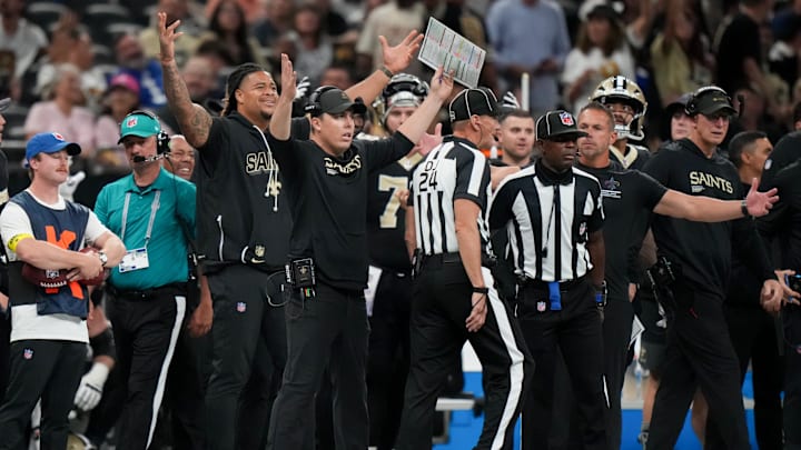 Oct 5, 2025; New Orleans, Louisiana, USA; New Orleans Saints head coach Kellen Moore signals from the sideline against the New York Giants during the fourth quarter at Caesars Superdome. Mandatory Credit: Matthew Hinton-Imagn Images