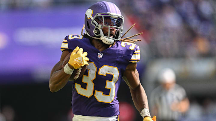 Sep 22, 2024; Minneapolis, Minnesota, USA; Minnesota Vikings running back Aaron Jones (33) in action during the game against the Houston Texans at U.S. Bank Stadium.