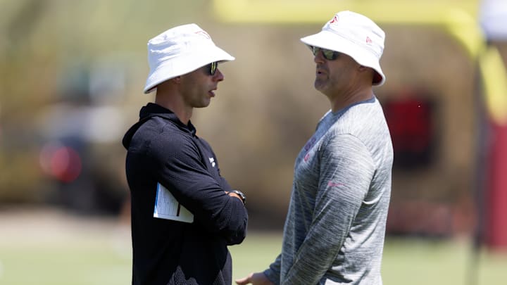 Jun 10, 2025; Tempe, AZ, USA; Arizona Cardinals head coach Jonathan Gannon (left) with general manager Monti Ossenfort during minicamp at the teams Arizona Cardinals Training Facility. Mandatory Credit: Mark J. Rebilas-Imagn Images Jun 10, 2025; Tempe, AZ, USA; Arizona Cardinals head coach Jonathan Gannon (left) with general manager Monti Ossenfort during minicamp at the teams Arizona Cardinals Training Facility. Mandatory Credit: Mark J. Rebilas-Imagn Images