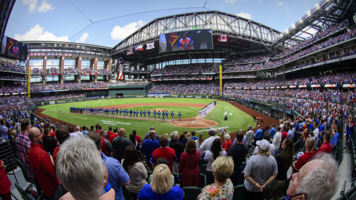 Apr 5, 2021; Arlington, Texas, USA; A view of the crowd and the fans and the stands during the playing of the Canadian and USA national anthems before the game between the Texas Rangers and the Toronto Blue Jays at Globe Life Field.