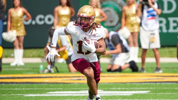 Sep 14, 2024; Columbia, Missouri, USA; Boston College Eagles wide receiver Lewis Bond (11) runs the ball against the Missouri Tigers during the first half at Faurot Field at Memorial Stadium. Mandatory Credit: Denny Medley-Imagn Images
