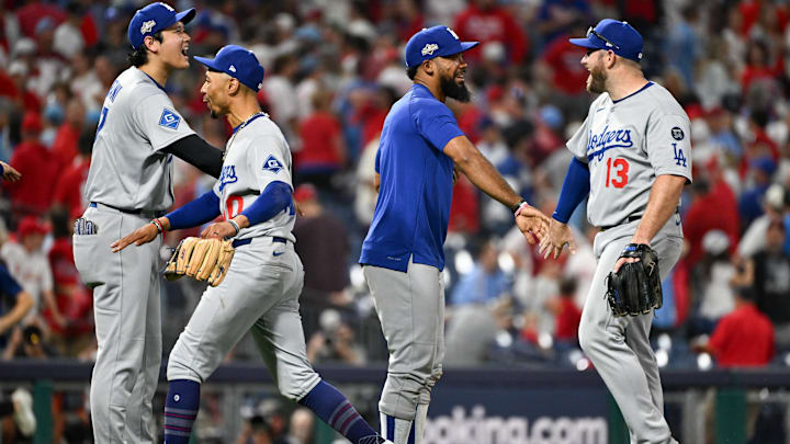 Oct 6, 2025; Philadelphia, Pennsylvania, USA; Los Angeles Dodgers designated hitter Shohei Ohtani (17), shortstop Mookie Betts (50), right fielder Teoscar Hernandez (37) and third baseman Max Muncy (13) celebrate