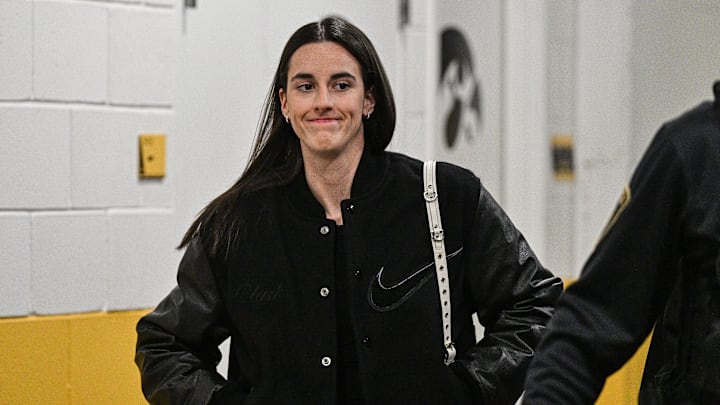 Feb 2, 2025; Iowa City, Iowa, USA; Former Iowa Hawkeyes player Caitlin Clark enters Carver-Hawkeye Arena before the game against the USC Trojans. The Hawkeyes will be retiring the jersey of Clark after the game. Mandatory Credit: Jeffrey Becker-Imagn Images
