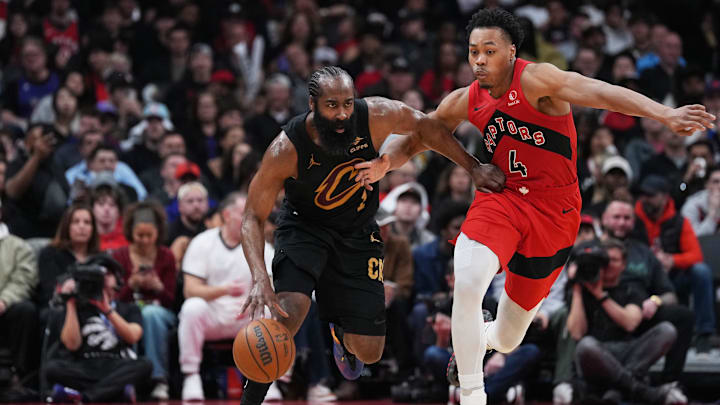 May 1, 2026; Toronto, Ontario, CAN; Cleveland Cavaliers guard James Harden (1) battles with Toronto Raptors forward Scottie Barnes (4) during the third quarter in game six of the first round of the 2026 NBA Playoffs at Scotiabank Arena. Mandatory Credit: Nick Turchiaro-Imagn Images