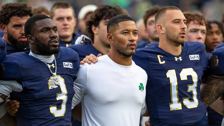 Sep 12, 2026; South Bend, Indiana, USA; Notre Dame Fighting Irish head coach Marcus Freeman along with linebacker Jaylen Sneed (3) and quarterback CJ Carr (13) sing the alma mater after beating the Rice Owls at Notre Dame Stadium. Mandatory Credit: Michael Caterina-Imagn Images Sep 12, 2026; South Bend, Indiana, USA; Notre Dame Fighting Irish head coach Marcus Freeman along with linebacker Jaylen Sneed (3) and quarterback CJ Carr (13) sing the alma mater after beating the Rice Owls at Notre Dame Stadium. Mandatory Credit: Michael Caterina-Imagn Images