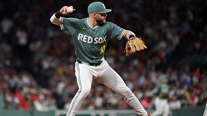 Sep 26, 2025; Boston, Massachusetts, USA; Boston Red Sox shortstop Trevor Story (10) throws the ball to first base for an out against the Detroit Tigers during the fifth inning at Fenway Park. Mandatory Credit: Eric Canha-Imagn Images