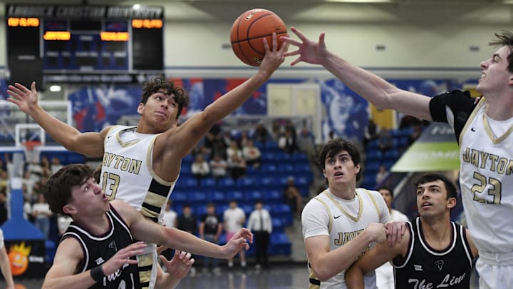 Jayton's Sean Stanaland grabs a rebound against Texline in a Class 1A Division II state semifinal boys basketball game Monday, March 3, 2025, at the Rip Griffin Center.