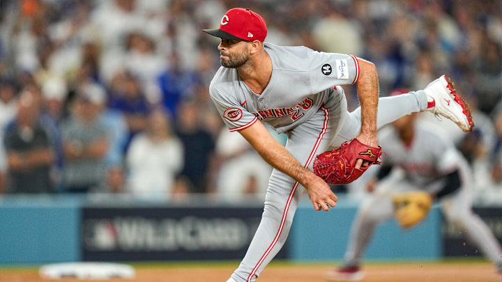 Cincinnati Reds starting pitcher Nick Martinez (28) throws a pitch in relief in the sixth inning of the MLB National League Wild Card Game 2 between the Los Angeles Dodgers and the Cincinnati Reds at Dodger Stadium in Los Angeles on Wednesday, Oct. 1, 2025. The Reds were eliminated from the postseason with an 8-4 loss to the reining World Series Champions La Dodgers. Cincinnati Reds starting pitcher Nick Martinez (28) throws a pitch in relief in the sixth inning of the MLB National League Wild Card Game 2 between the Los Angeles Dodgers and the Cincinnati Reds at Dodger Stadium in Los Angeles on Wednesday, Oct. 1, 2025. The Reds were eliminated from the postseason with an 8-4 loss to the reining World Series Champions La Dodgers.
