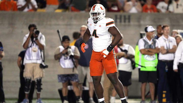 Oct 5, 2024; Berkeley, California, USA; Miami Hurricanes defensive lineman Rueben Bain Jr. (4) reacts after a tackle against the California Golden Bears during the first quarter at California Memorial Stadium. Mandatory Credit: Darren Yamashita-Imagn Images