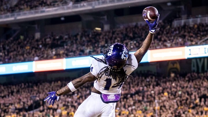 TCU's Jordyn Bailey with a one-handed catch to put the Frogs on the board first in the game against Baylor. TCU's Jordyn Bailey with a one-handed catch to put the Frogs on the board first in the game against Baylor.