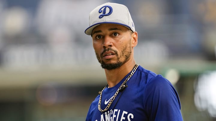 Dodgers infielder Mookie Betts looks around during batting practice prior to a game against the Milwaukee Brewers at American Family Field on July 8. Dodgers infielder Mookie Betts looks around during batting practice prior to a game against the Milwaukee Brewers at American Family Field on July 8.