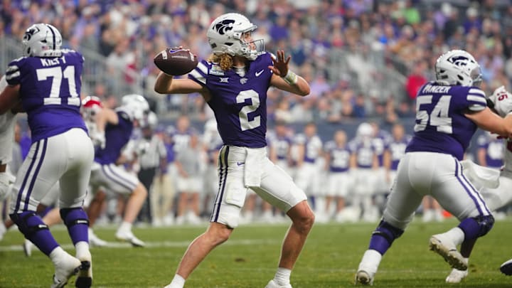 Kansas State quarterback Avery Johnson (2) throws a pass against Rutgers during second half of the Rate Bowl at Chase Field on Dec. 26, 2024, in Phoenix.