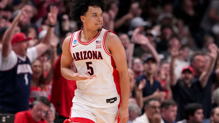 Arizona Wildcats guard Brayden Burries (5) reacts after scoring a three-point field goal against the Purdue Boilermakers during a NCAA Tournament game Saturday, March 28, 2026 at SAP Center in San Jose, Calif. Purdue fell to Arizona 79-64.