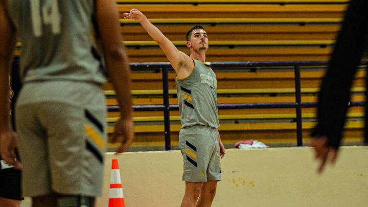 Southern Miss guard Elliot Tulip shoots a corner three during a Golden Eagles summer practice. Southern Miss guard Elliot Tulip shoots a corner three during a Golden Eagles summer practice.
