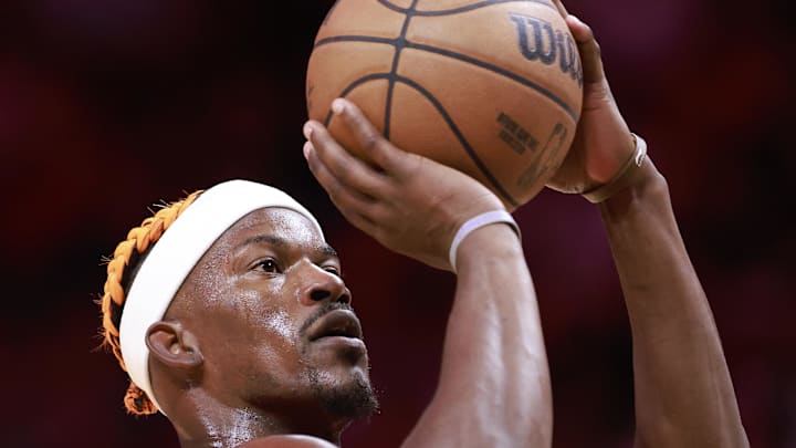 Dec 12, 2024; Miami, Florida, USA;  Miami Heat forward Jimmy Butler (22) shoots a technical foul against the Toronto Raptors during the second half at Kaseya Center. Mandatory Credit: Rhona Wise-Imagn Images
