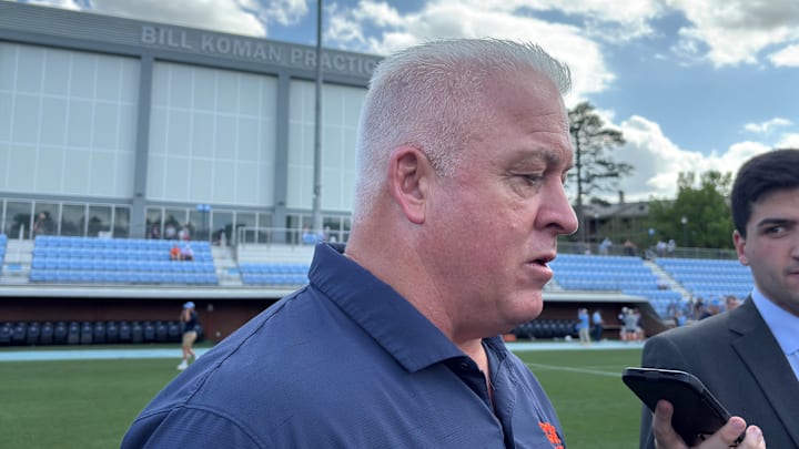 Syracuse coach Gary Gait speaks to the media on the field following the Orange's 14-9 defeat to North Carolina Saturday afternoon in Chapel Hill, N.C. Syracuse coach Gary Gait speaks to the media on the field following the Orange's 14-9 defeat to North Carolina Saturday afternoon in Chapel Hill, N.C.