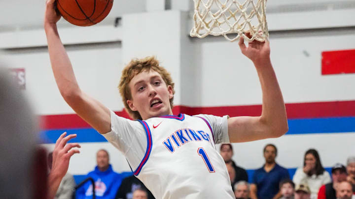 Wisconsin Lutheran's Kager Knueppel (1) grabs a rebound during the game against Slinger at Wisconsin Lutheran High School, in Milwaukee, Wisconsin, Dec. 9, 2025. Wisconsin Lutheran won the game, 68-46.