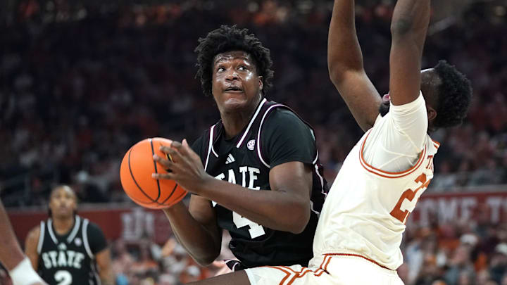 Mississippi State Bulldogs forward Brandon Walker (4) looks to shoot against Texas Longhorns forward Lassina Traore (23) during the second half at Moody Center.