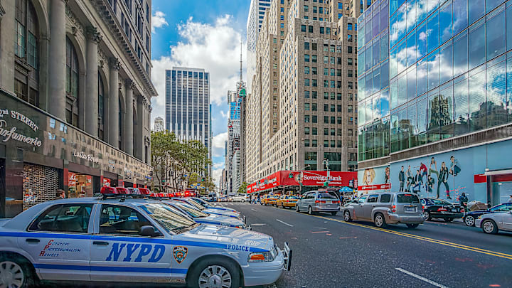 Police cars on 42th street, NYC, USA Police cars on 42th street, NYC, USA